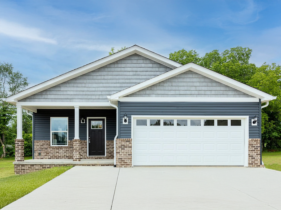 Kitchen amenities with quartz countertops and stainless appliances